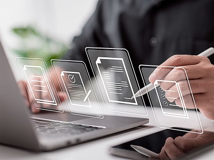 Computer files graphic - person working on laptop