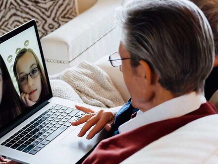 Couple video chatting with kids