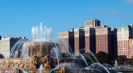 Historic Hilton Hotel in background of park and fountain