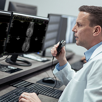 Doctor using Exa mammo