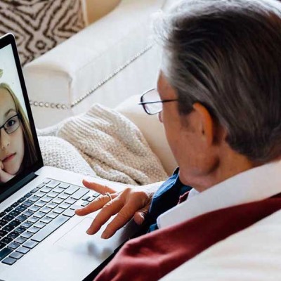 Couple video chatting with kids