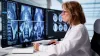 A female Radiology reviewing scans via teleradiology software