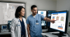 A rad tech and radiologist reviewing data charts from AeroRemote Insights